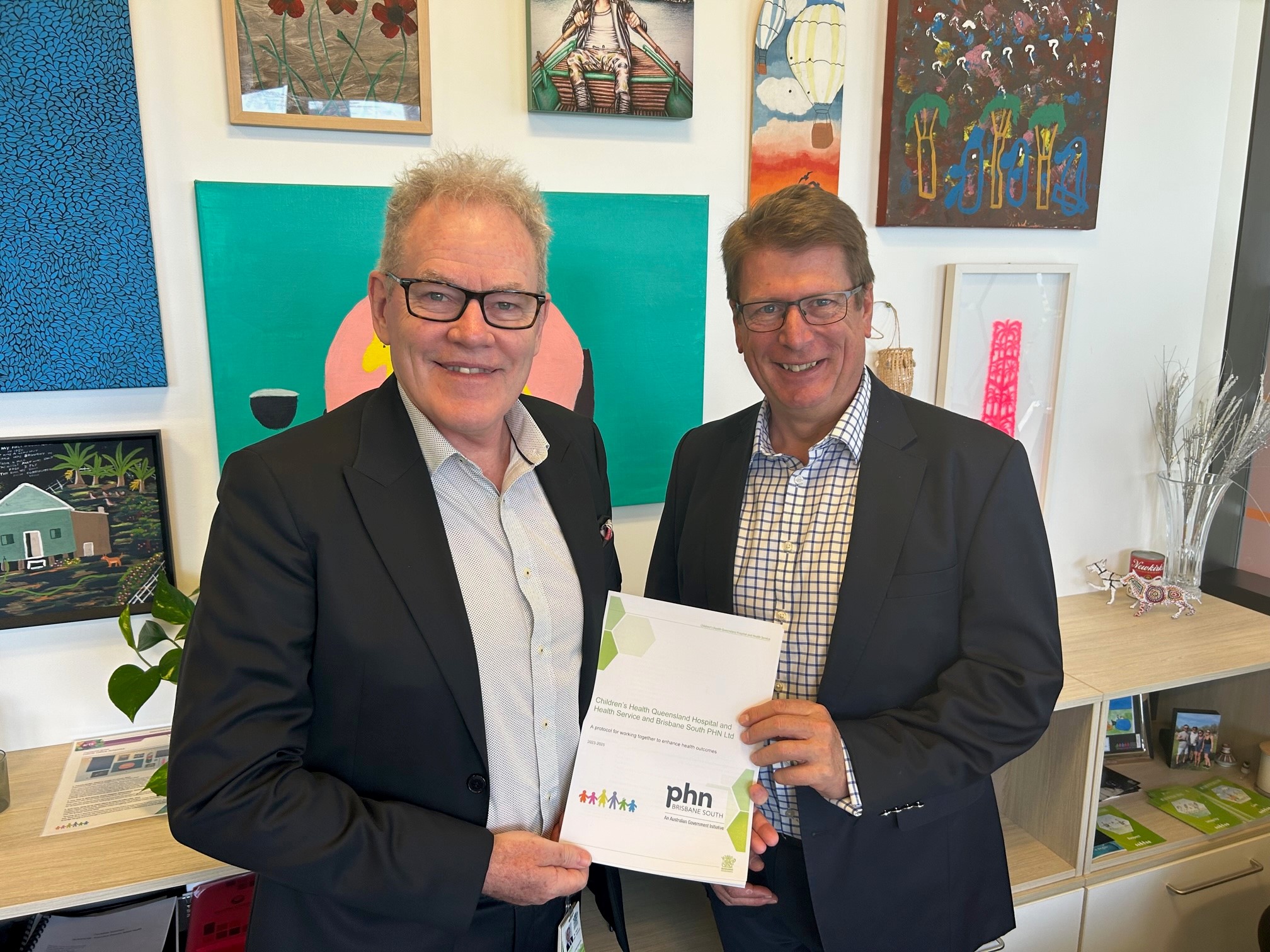 Pictured is Children’s Health Queensland CEO, Frank Tracey (left) and Brisbane South PHN CEO, Mike Bosel (right) at the signing of the organisations' renewed Engagement Protocol 2023-2025.